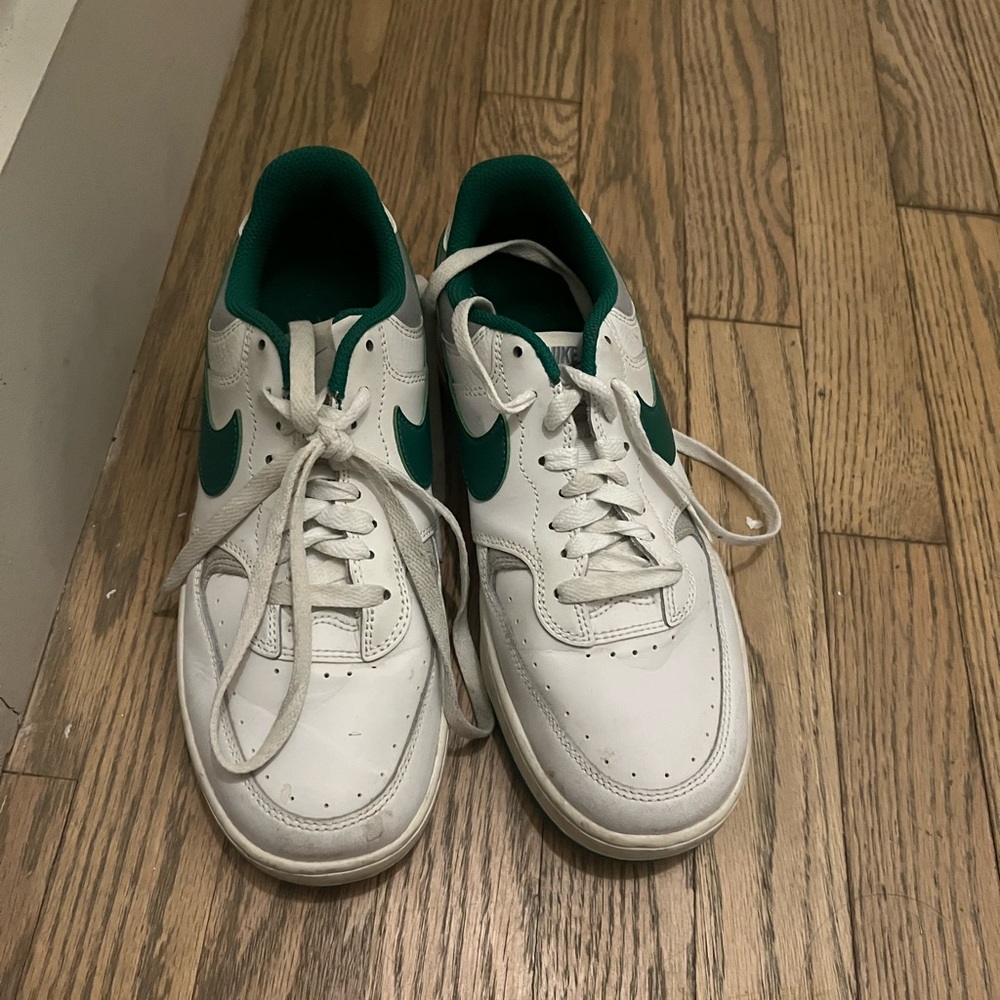 Nike White Low-Top Sneakers with Green Swoosh